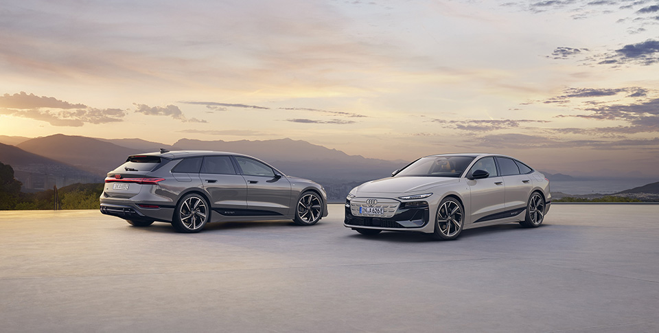 Zwei Audi A6 e-tron von vorne und hinten.
